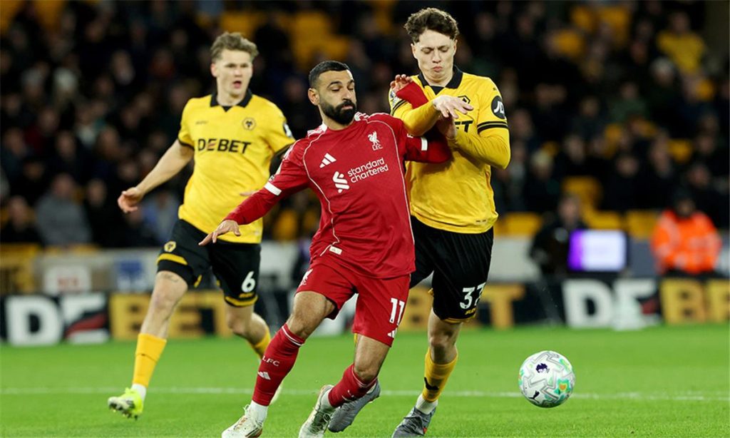 عنوان احترافي حصري: "استعراض أداء محمد صلاح في مباراة ليفربول ضد ولفرهامبتون بالدوري الإنجليزي: أبرز اللحظات والتفاصيل"